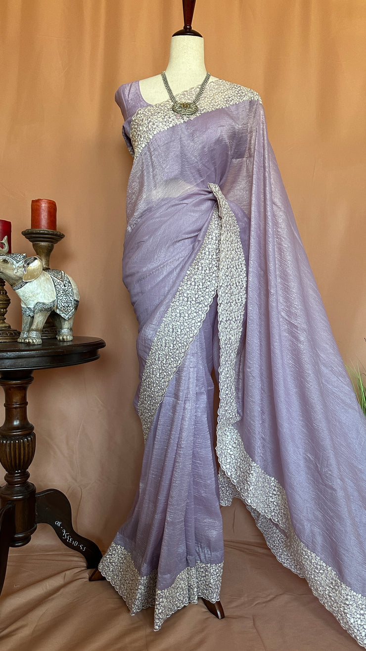 Crushed tissue saree with cut work and stitched blouse