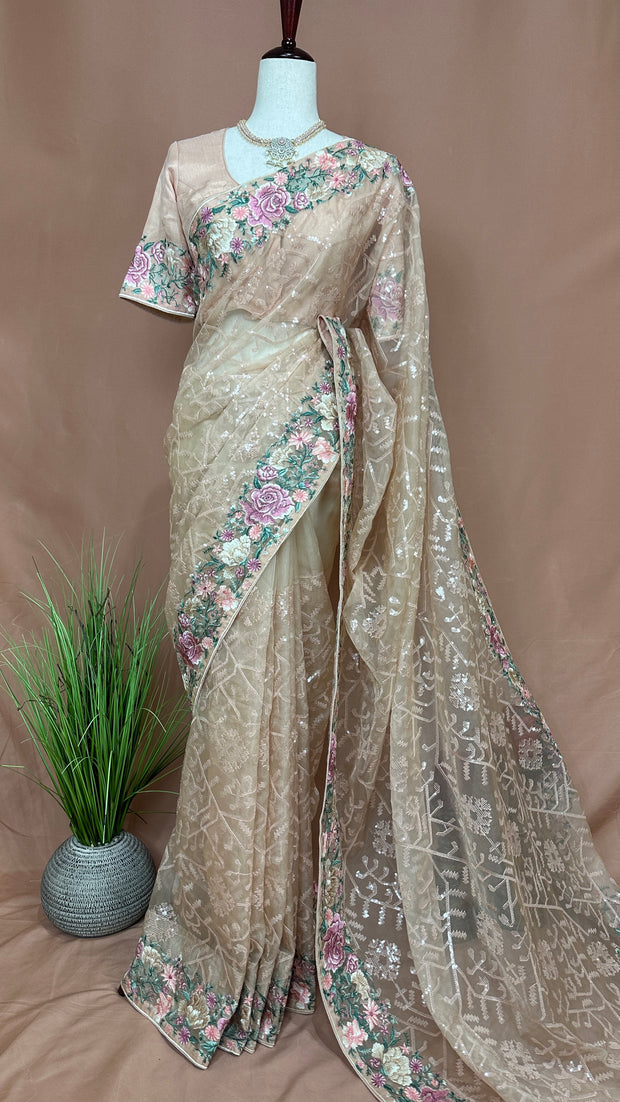 Peach soft organza saree with sequins and embroidery, with stitched blouse