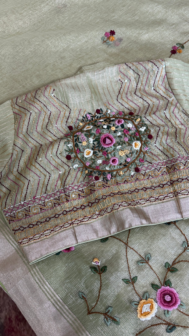 Grey tissue linen saree with hand emroidery and stitched blouse