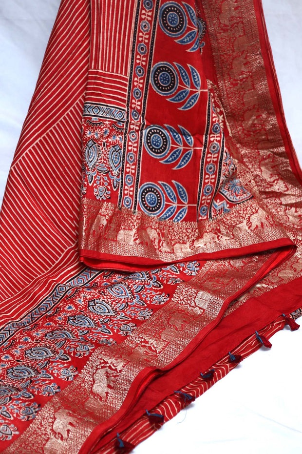 Dola silk saree with Ajrakh hand block print , stitched blouse