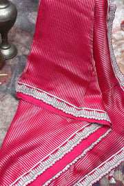 Pink tissue designer saree with stitched blouse