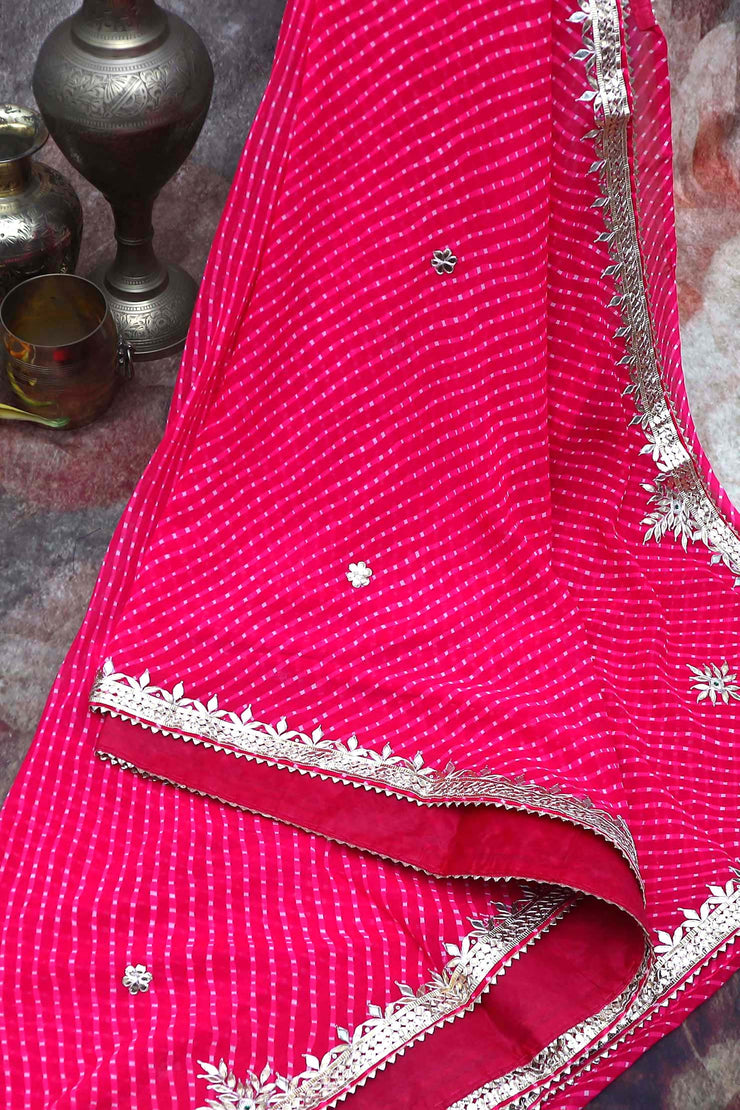 Pink lehariya print georgette saree with gotta work border, stitched blouse