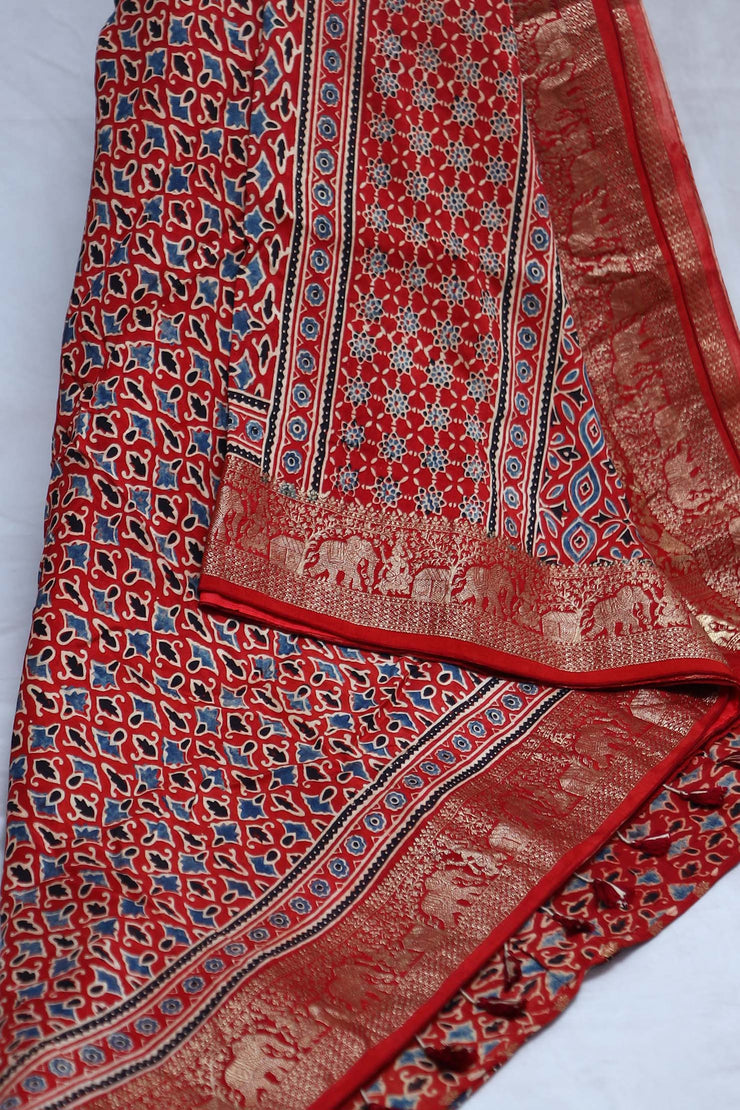 Dola silk saree with Ajrakh hand block print , stitched blouse