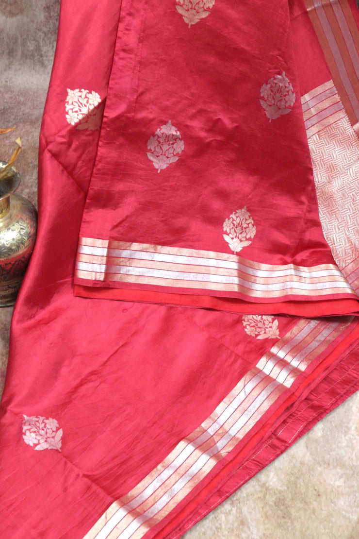 Red soft katan silk saree with silver and gold weave, with stitched blouse