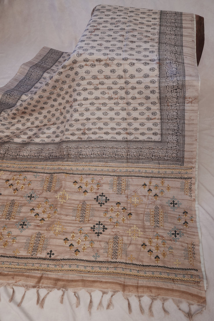 Printed Tussar silk saree with hand emroidery and stitched blouse