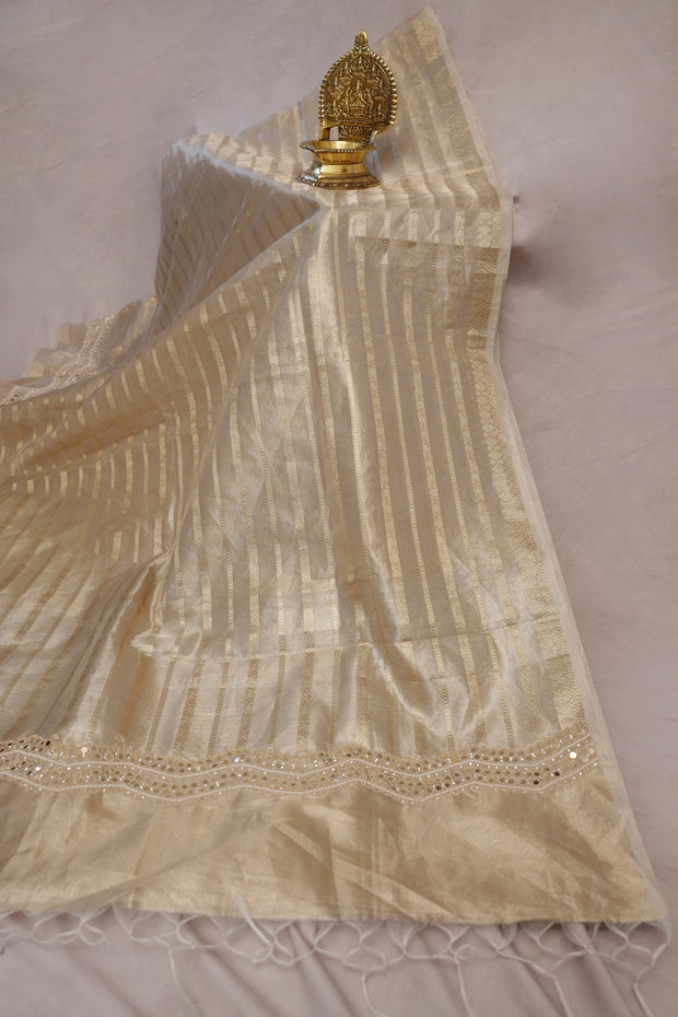 Pure Gold tissue saree with mirror and bead work, with stitched blouse