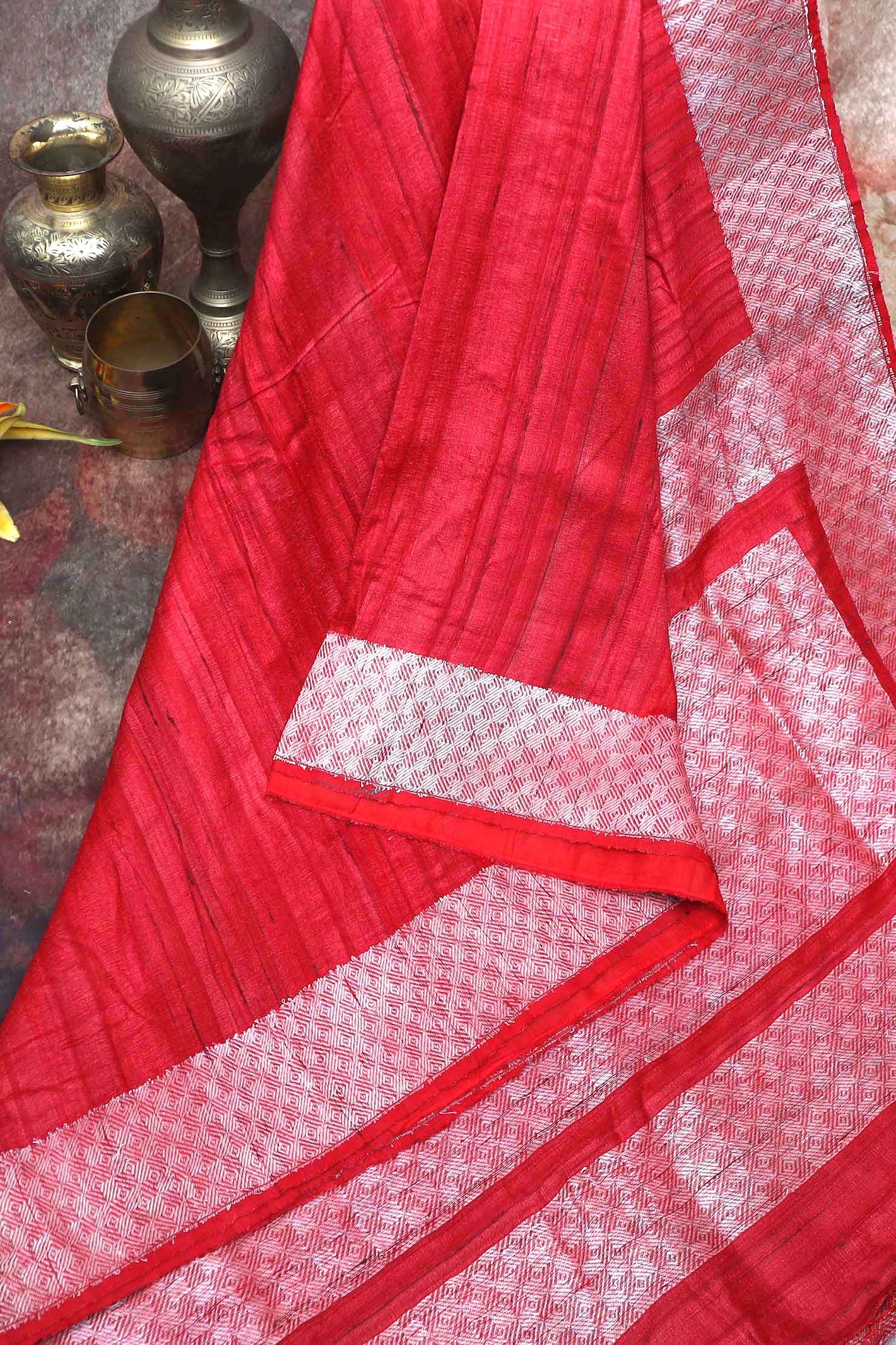 Brick red pure tussar silk handloom saree with silver zari, stitched blouse