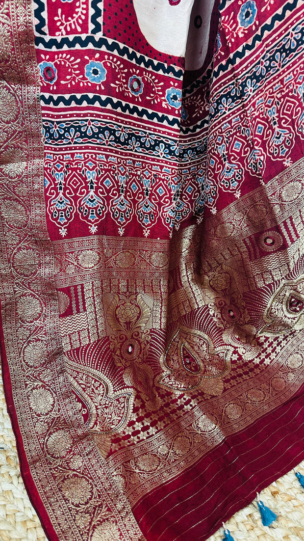 Red Ajrakh dola silk saree with hand work , with stitched blouse