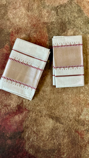 Set mundu with copper zari and maroon thread weave