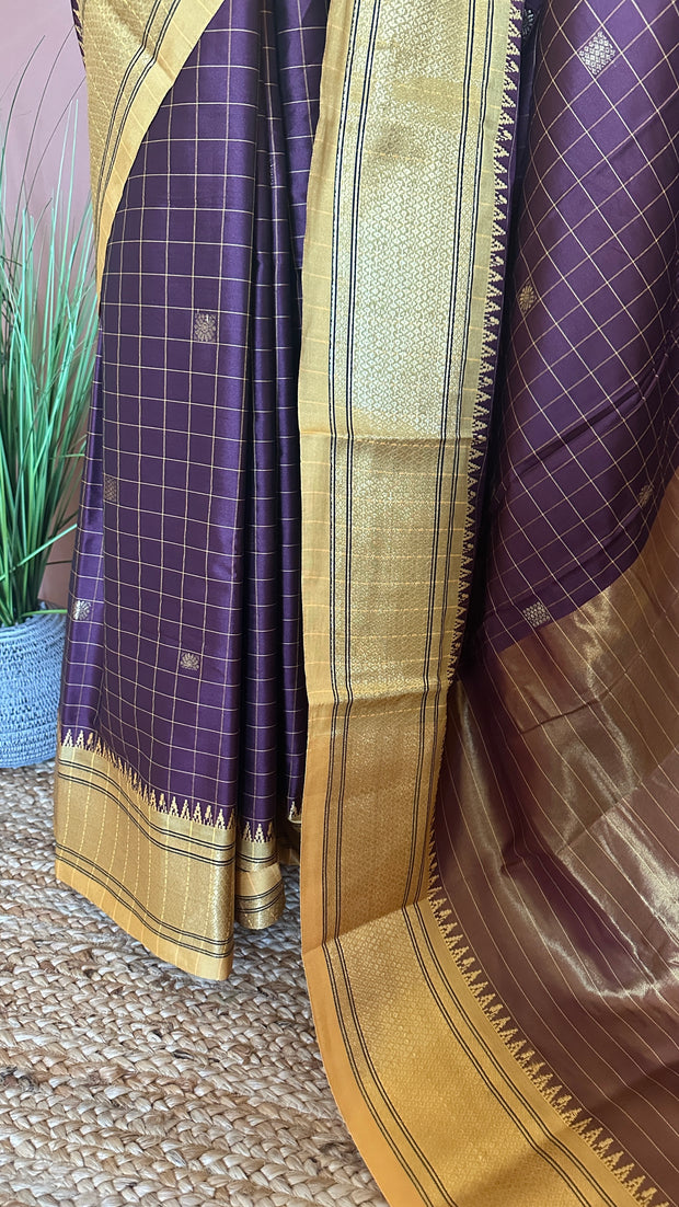 Coffe Brown semi silk saree with yellow temple border, with stitched blouse