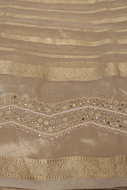 Pure Gold tissue saree with mirror and bead work, with stitched blouse