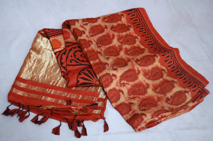 Vanaspati hand block print on modal silk saree with zari pallu and with stitched blouse