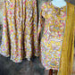 Mustard yellow printed muslin kurti with flared palazo and dupatta