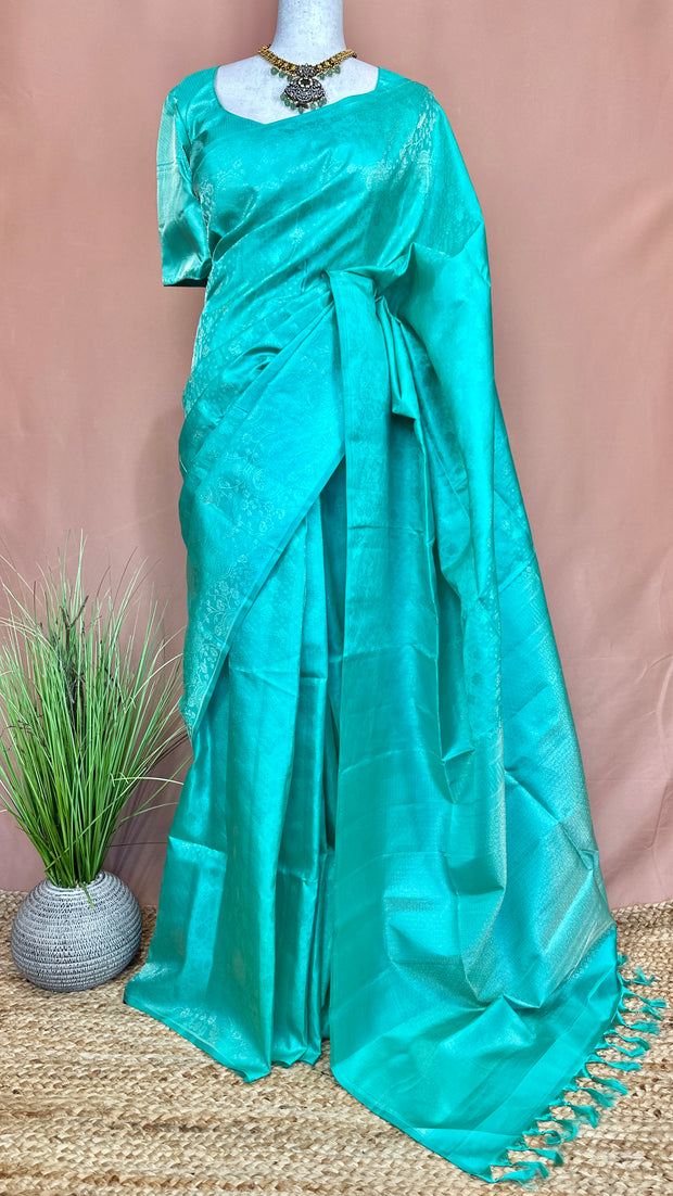 Jade green brocade saree with stitched blouse