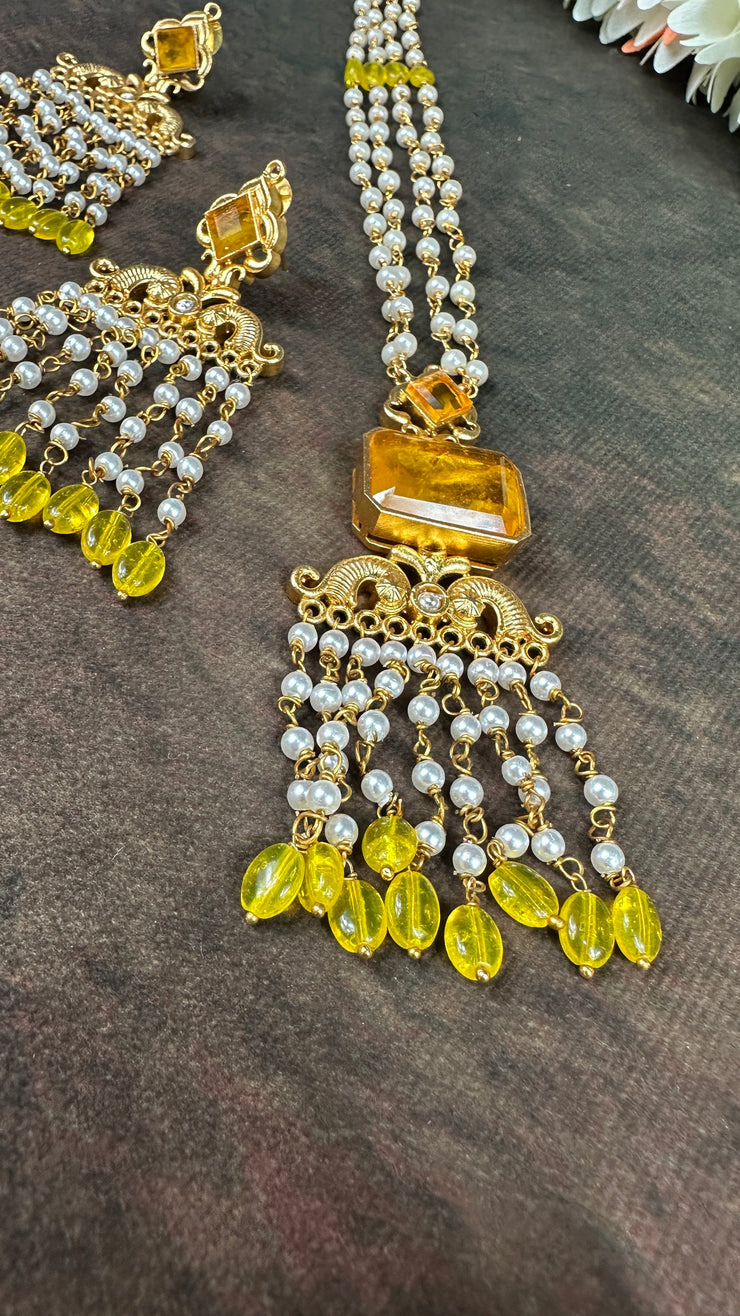 Pearl necklace with Yellow stone and chandlier earrings