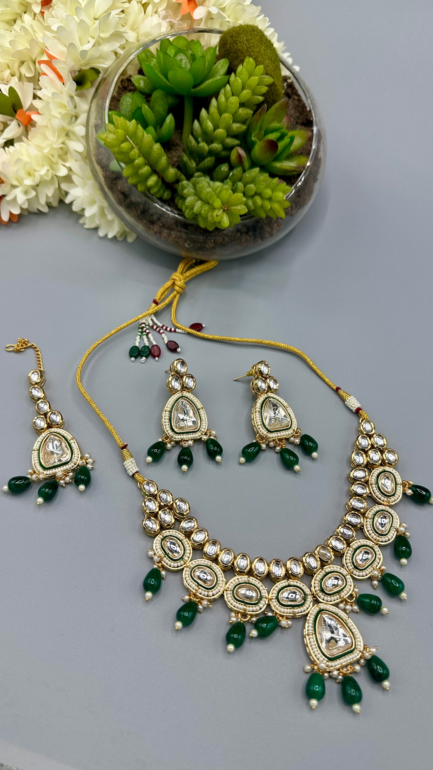 Kundan necklace and earring with green beads