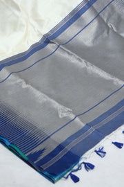 Semi tussar silk saree with temple border weave, with stitched blouse