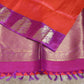 Orange 80/20 Kanchivaram saree with purple border, stitched blouse