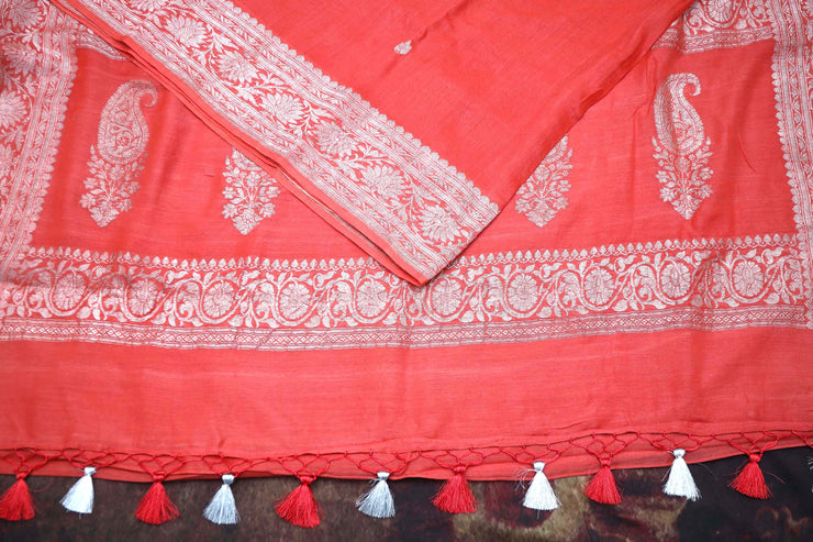 Coral color hanloom munga silk saree with silver zari banarsi weave , stitched blouse