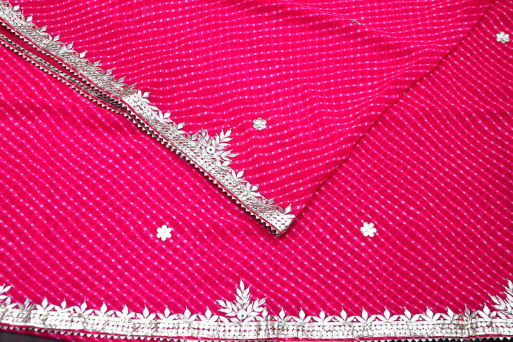 Pink lehariya print georgette saree with gotta work border, stitched blouse