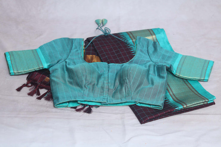 Coffe brown semi silk saree with light blue temple border, with stitched blouse