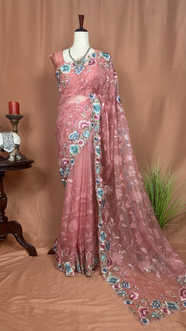 Coral soft organza saree with sequins and embroidery, with stitched blouse