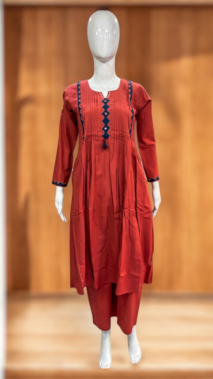 Orange cotton kurti with mirror and hadwork, and bottom