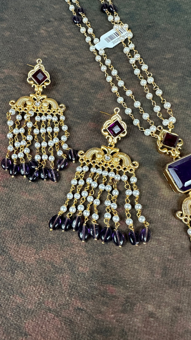 Pearl necklace with purple stone and chandlier earrings