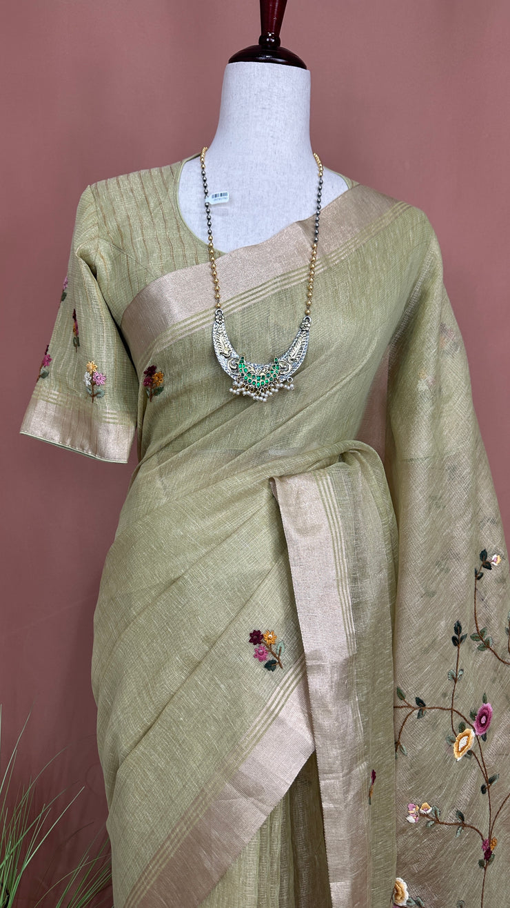 Grey Tissue Linen Saree with Hand Embroidery  and stitched blouse