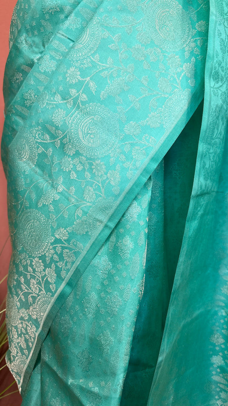 Jade green brocade saree with stitched blouse