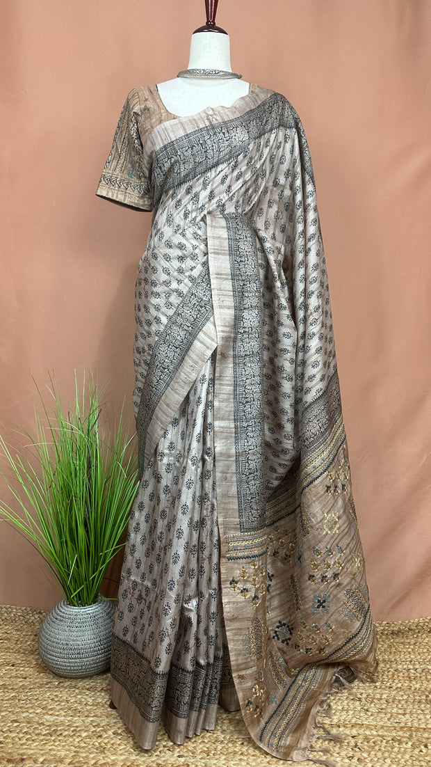 Printed Tussar silk saree with hand emroidery and stitched blouse