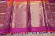 Orange 80/20 Kanchivaram saree with purple border, stitched blouse