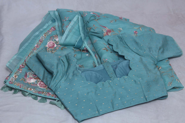 Light blue soft organza saree with Parsi gara machine embroidery work , with stitched blouse