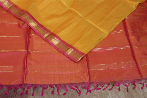 Yellow and Pink combo  Kanchivaram saree with stitched blouse