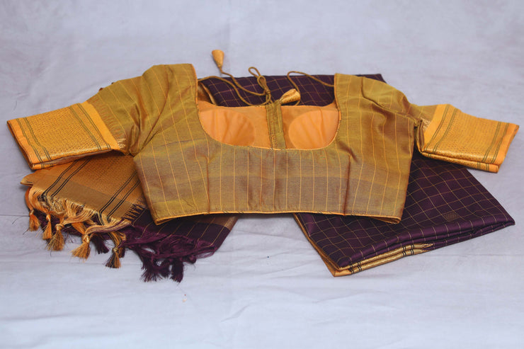 Coffe Brown semi silk saree with yellow temple border, with stitched blouse