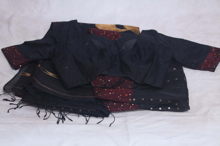 Black muslin saree with sequins weave, stitched blouse