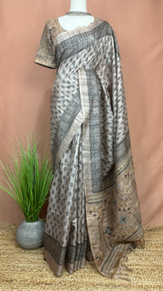 Printed Tussar silk saree with hand emroidery and stitched blouse