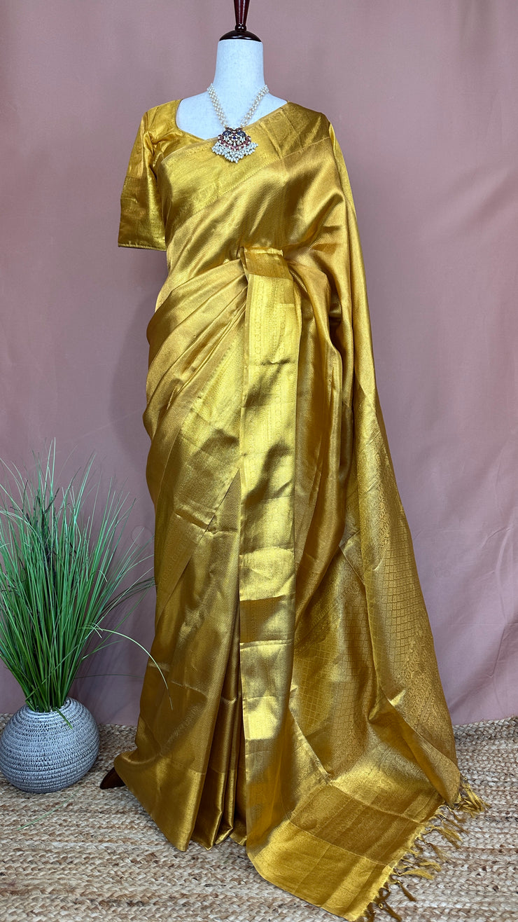 Gold brocade saree with stitched blouse