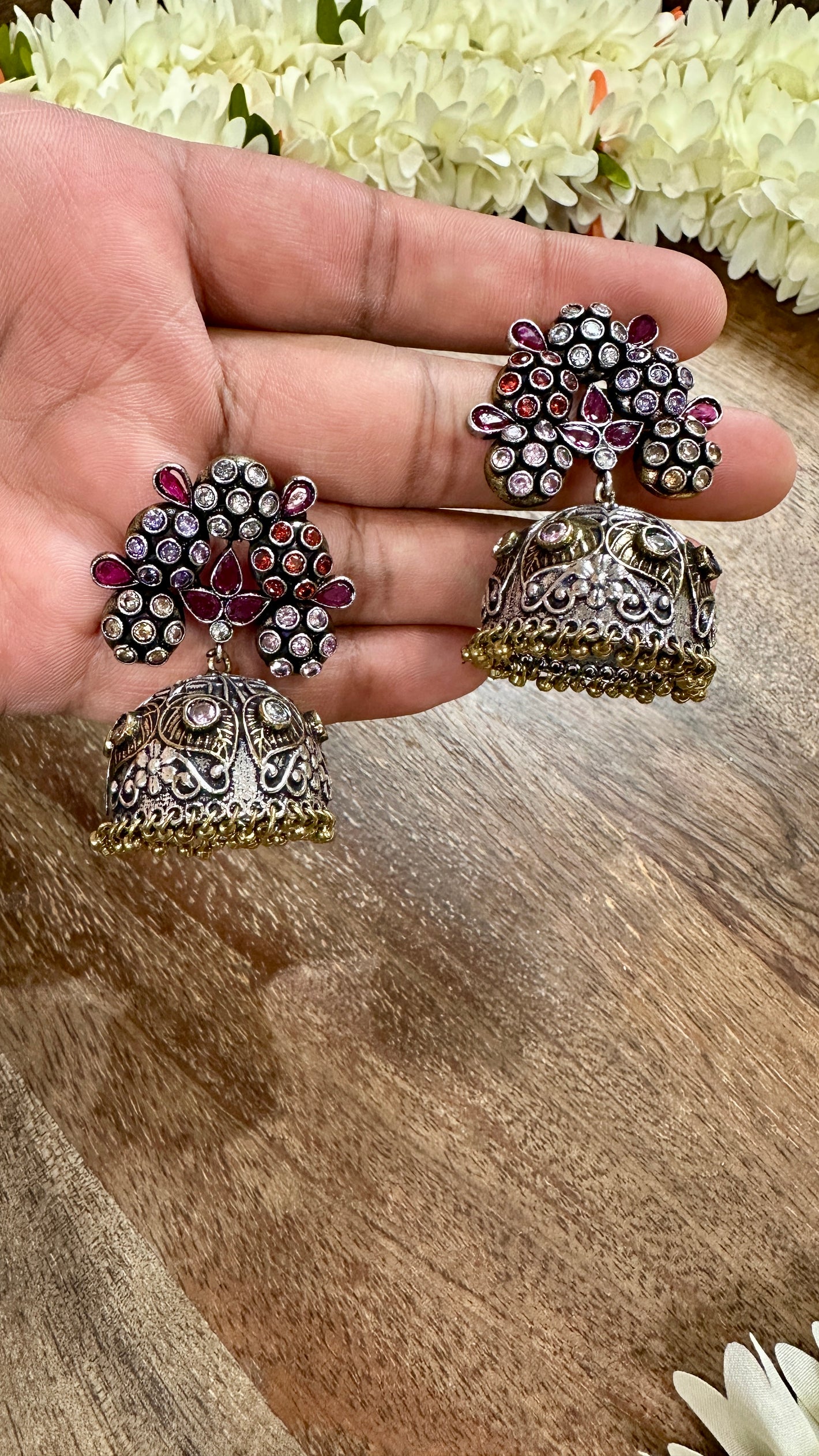 Dual tone jhumka with multi stone stud