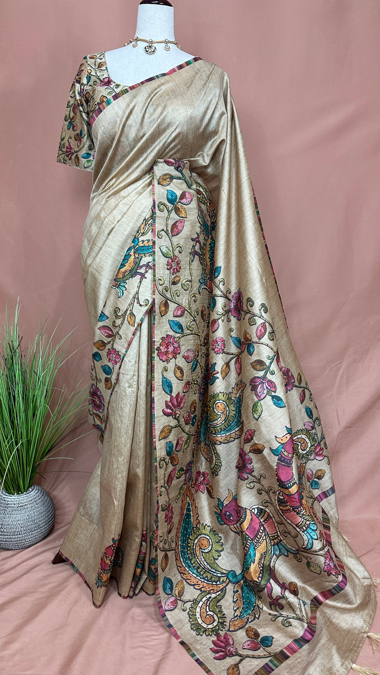 Light biscuit color Semi tussar silk saree with hand emroidery and sleeveless blouse