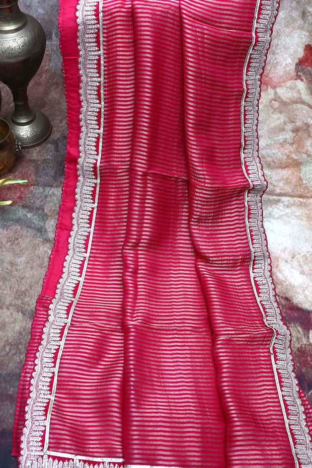 Pink tissue designer saree with stitched blouse