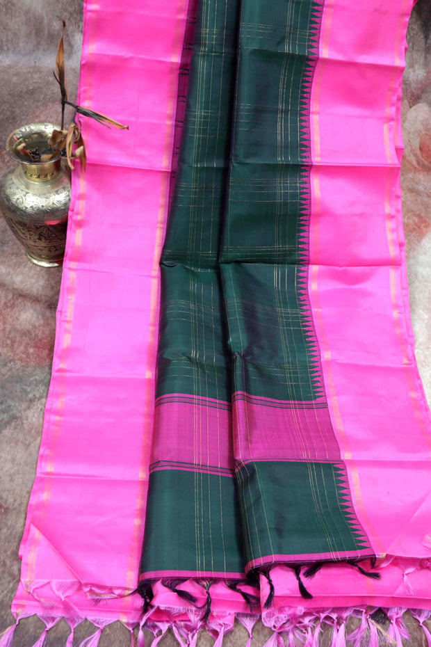 Handwoven Bottle green  Kanchivaram  pure silk saree with pink temple border and stitched blouse