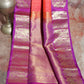 Orange 80/20 Kanchivaram saree with purple border, stitched blouse