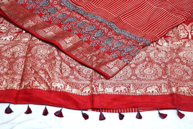 Dola silk saree with Ajrakh hand block print , stitched blouse