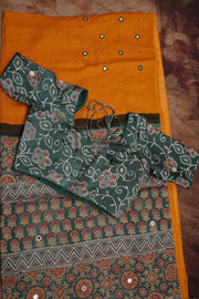 Ajrakh hand block printed Modal silk saree with bead and mirror wirk, with stitched blouse