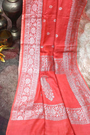 Coral color hanloom munga silk saree with silver zari banarsi weave , stitched blouse