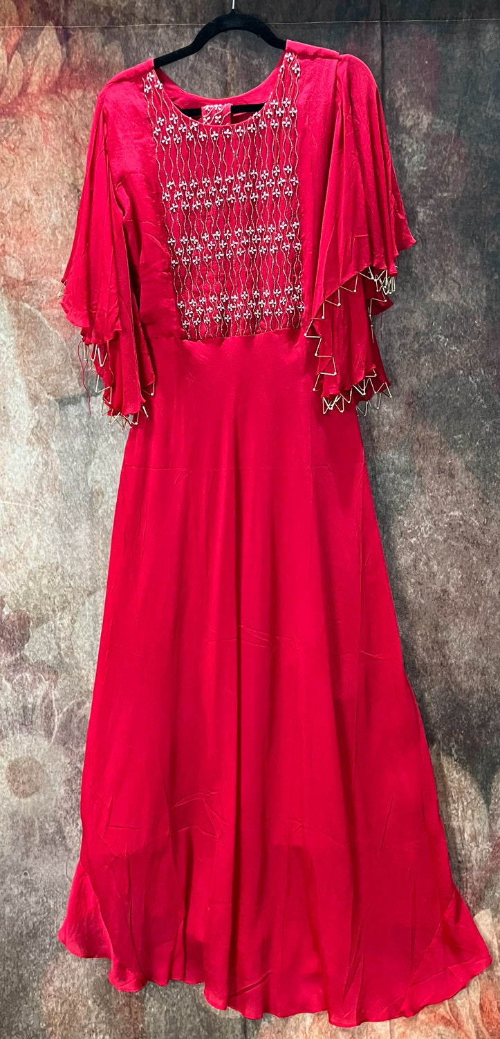 Red gown with sleeve pattern and belt
