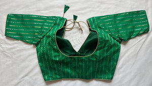 Green silk blouse with gold and silver weave