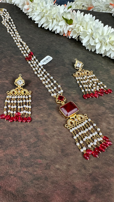 Pearl necklace with maroon stone and chandlier earrings