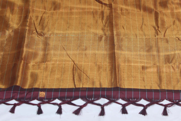 Coffe brown semi silk saree with light blue temple border, with stitched blouse